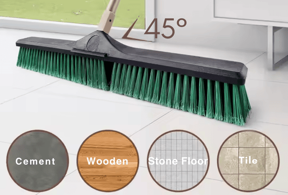 Broom with a 45° angled head designed for sweeping cement, wood, stone, and tile floors.