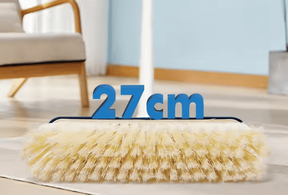 Brush with a 27 cm head size on the floor