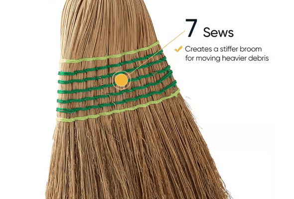 Broom with seven sewn bands for creating a stiffer broom to move heavier debris.