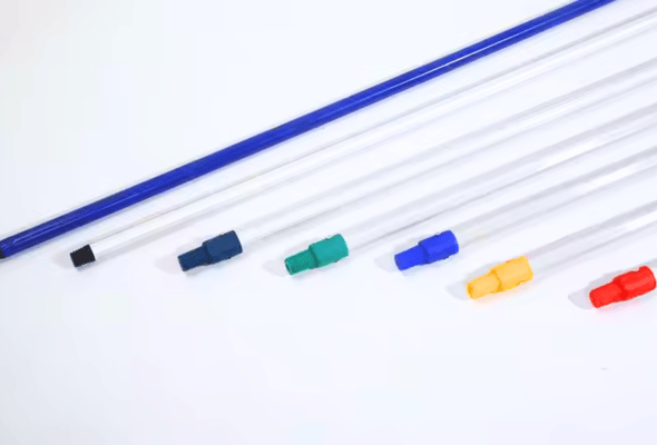 Colorful Mop Handles on White Background