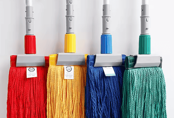 Colorful mops in a row