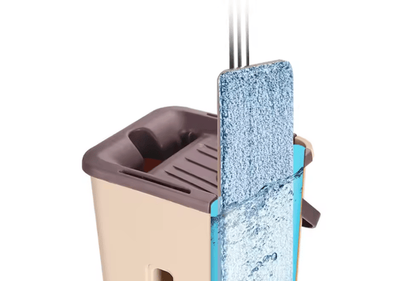 Flat mop in cleaning bucket