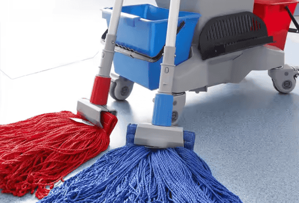 Red and blue mops with cleaning cart